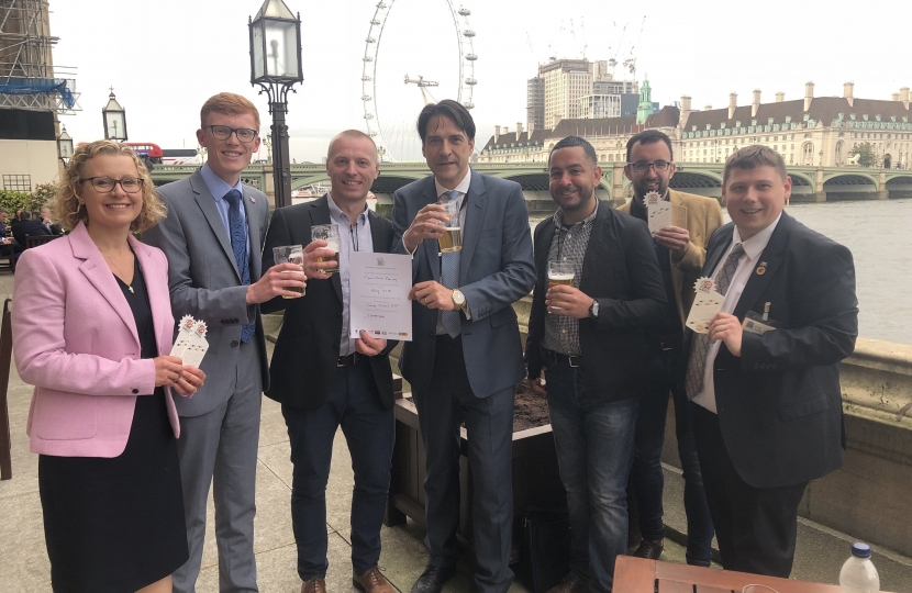 Cllr Ruth Buttery, Cllr Joe Roberts, Scott Povey, James Morris MP, Paul Williams, Jonathan Elliot and Cllr Simon Phipps on the Terrace of the Houses of Parliament